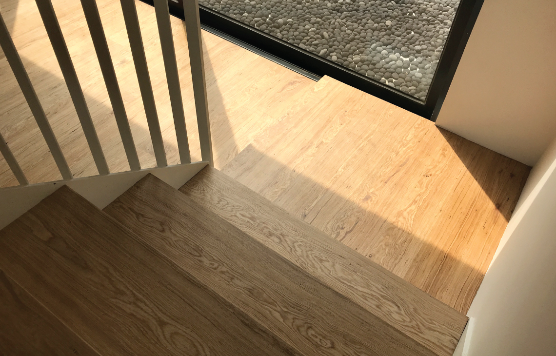 Onewood Solid Timber Flooring with Staircase Tread and Landing at Private Housing